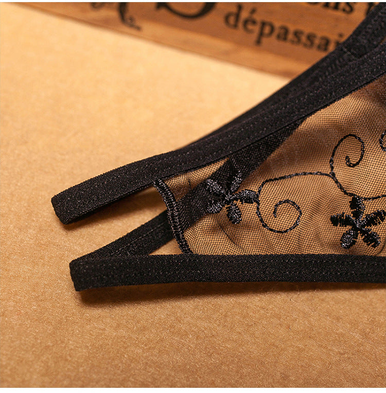 Seductive crotchless panties with a passion flower motif. Buy 3 and get 1 FREE!